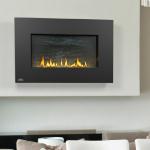 Napoleon Plazmafire Direct Vent fireplace- wall mounts 30” x 15” viewing area with Topaz Crystaline Ember bed; Slate brick panel includes 20” rigid thru the wall vent kit; optional LED light kit, remotes and trims. Natural or LP gas. 