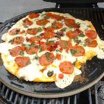 The Primo Pizza Stone is perfect for baking great tasting pizza and other dishes on your Primo. Available glazed and unglazed and in two sizes, 16 inches and 13 inches.